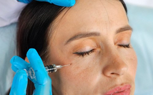 Female patient receiving BOTOX in Delafield