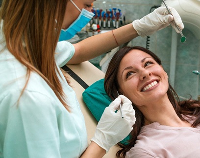 Woman after receiving dental bridge in Delafield