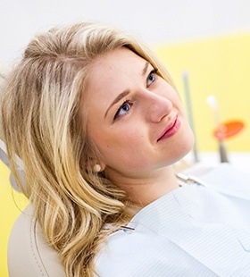 Smiling woman in dental chair