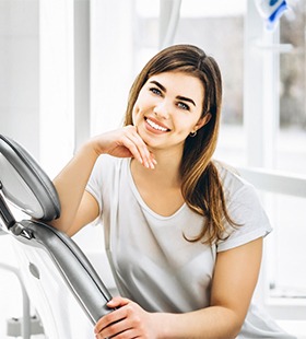 Healthy woman smiling after visiting her Delafield emergency dentist 