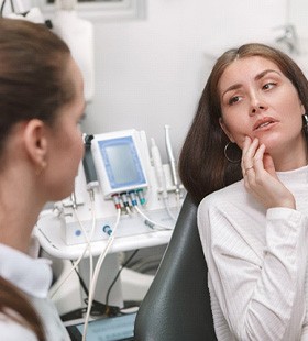 Woman visiting dentist in Delafield