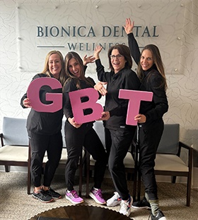 Bionica Dental Wellness team having fun with GBT letters