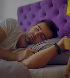 Man asleep while wearing Homeoblock 
