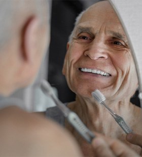 Man brushing teeth in Delafield    