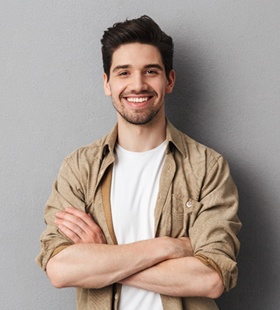 A young man smiling