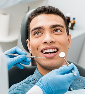 man getting a dental exam