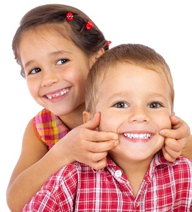 two children smiling after visiting with a dentist in Delafield