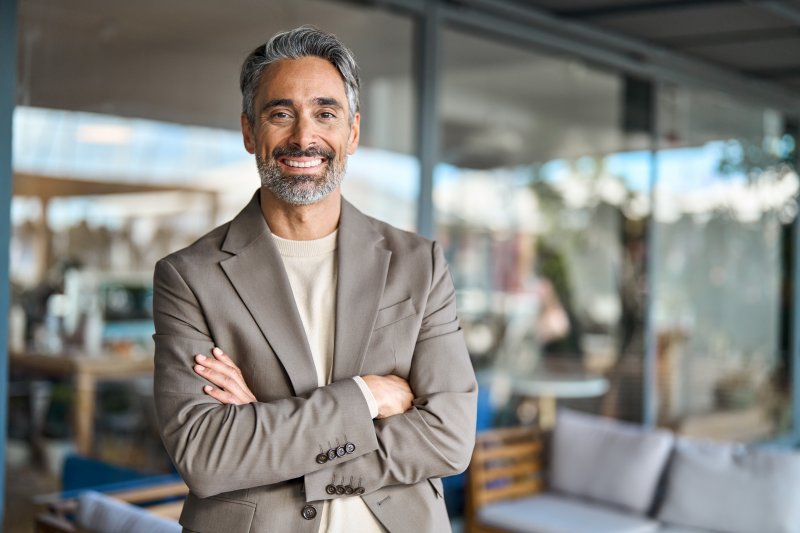 middle-aged male professional with veneers